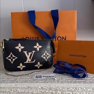 Authentic Louis Vuitton Bicolor Monogram Empreinte Mini Accessories Pochette